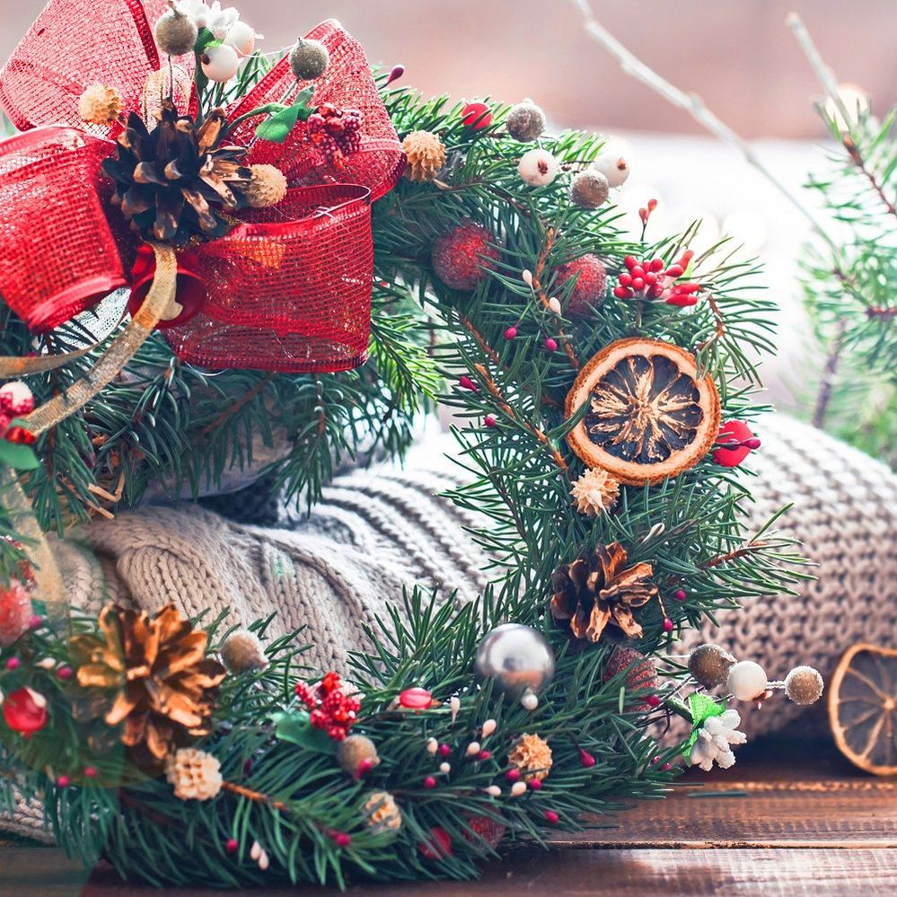 christmas-still-life-live-christmas-tree-decorations-festive-wreath-background-knitted-clothes.jpg